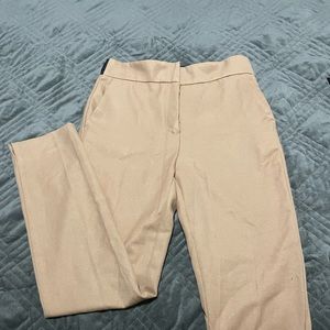 Woman’s tan Zara dress pants